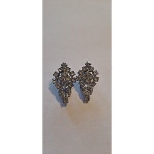 Vintage silvertone clip back earrings with colorless prong set rhinestones